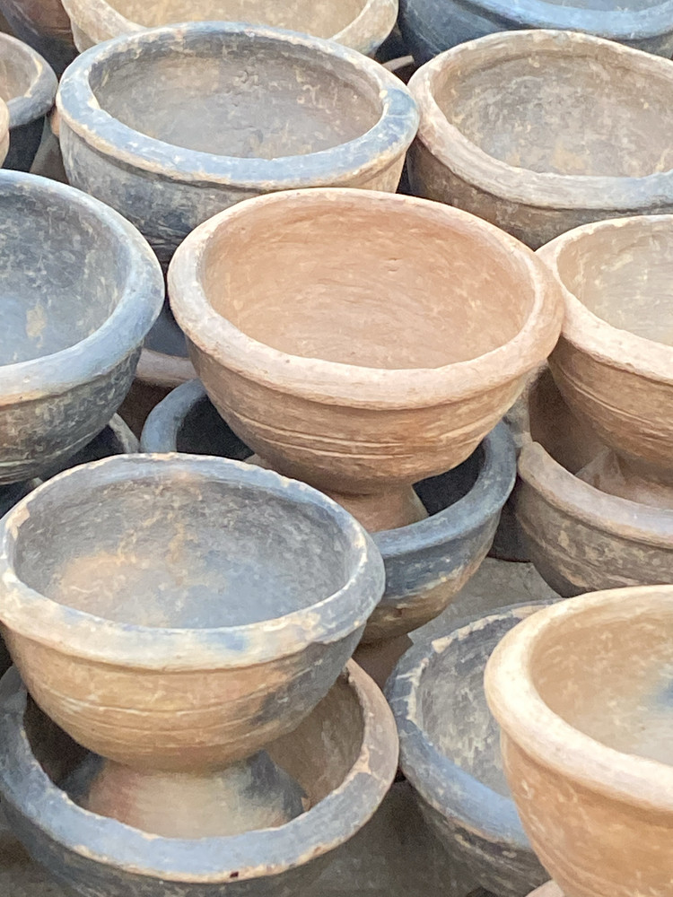 Clay scent~pots for powdered perfume 